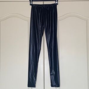 Black, shiny leggings. listed size M but fits XS.